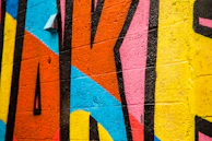 Creative wall mural featuring bold CMYK color blocks in office space.