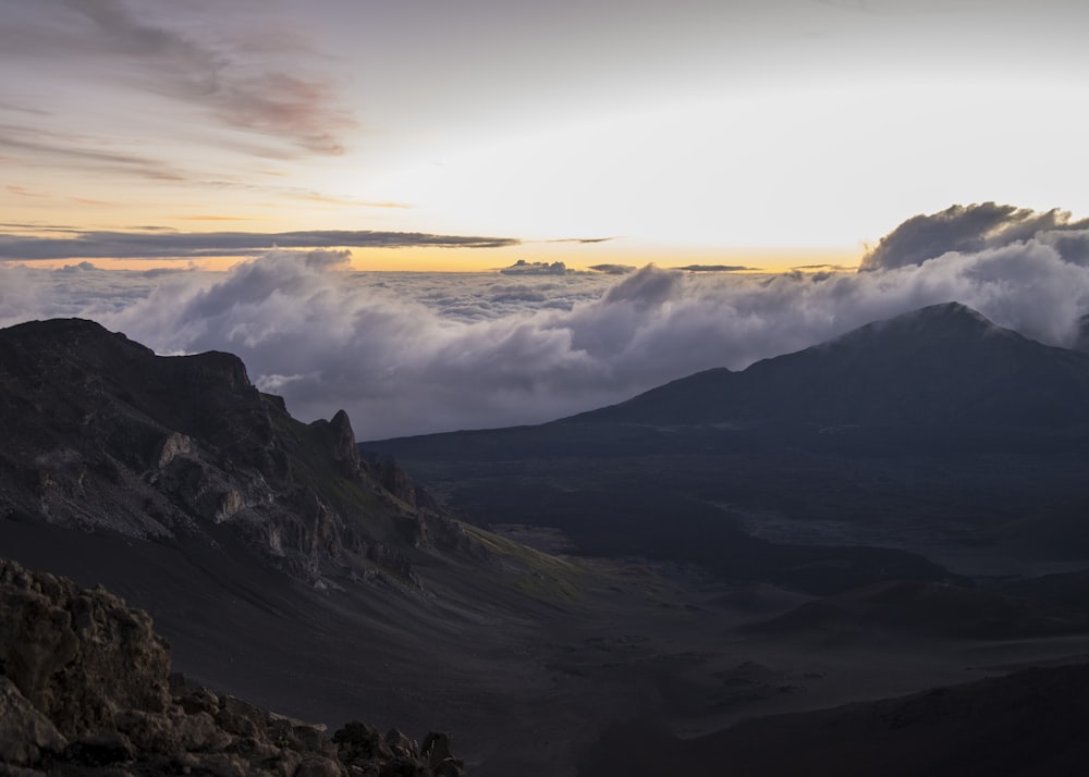 birds-eye view of mountain with sea of cloud