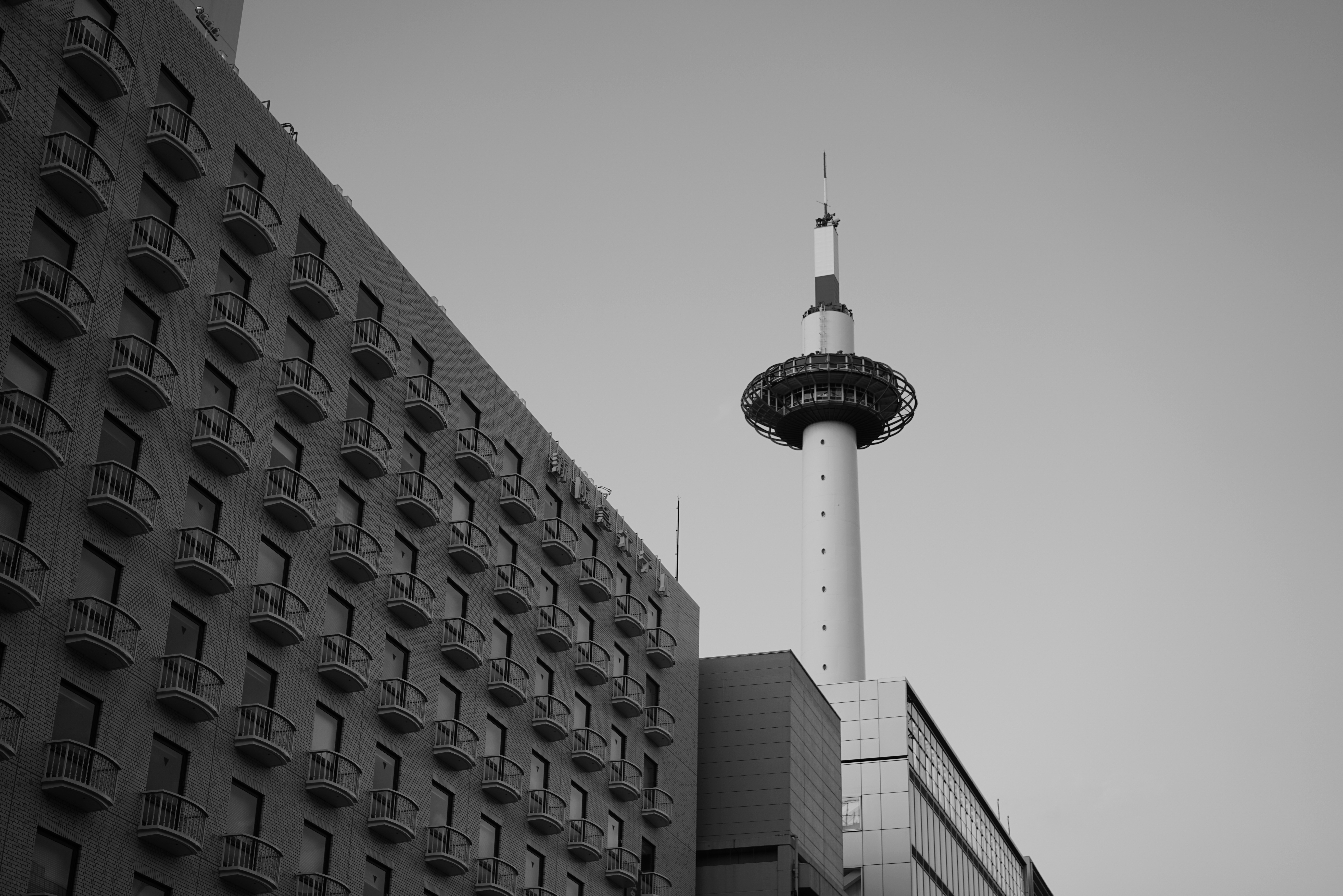 a black and white photo of a tall building