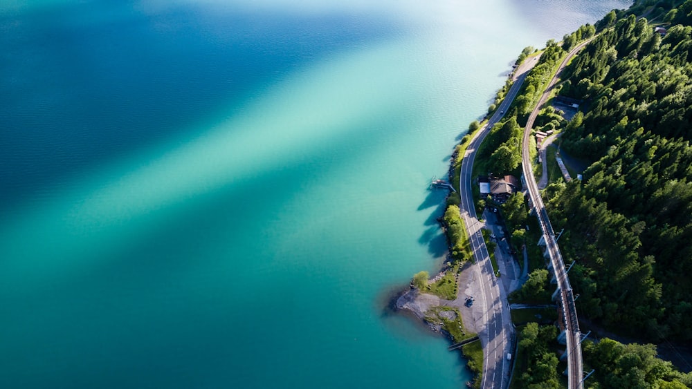 bird's eye view photography of road coastline