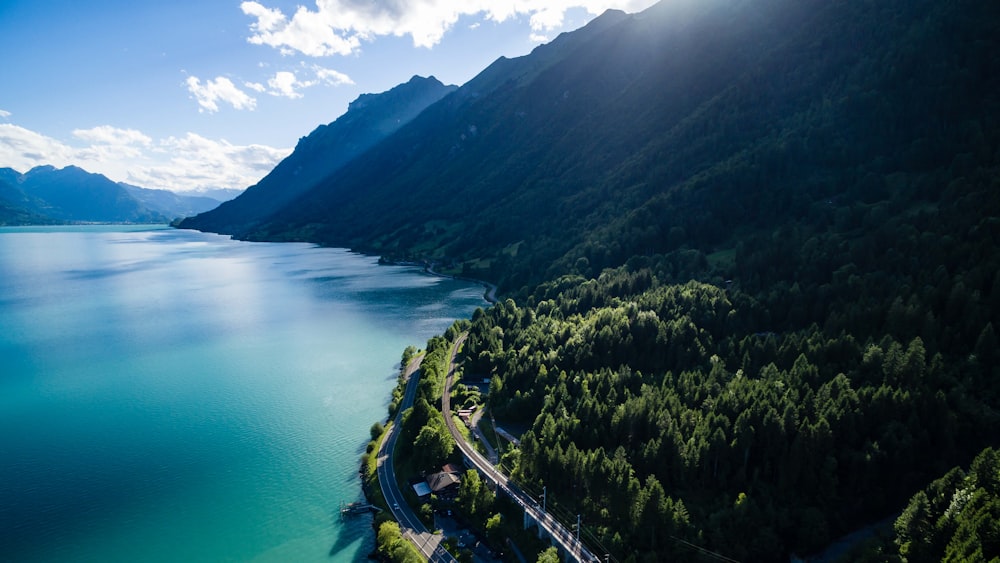 blue body of water under sunny sky