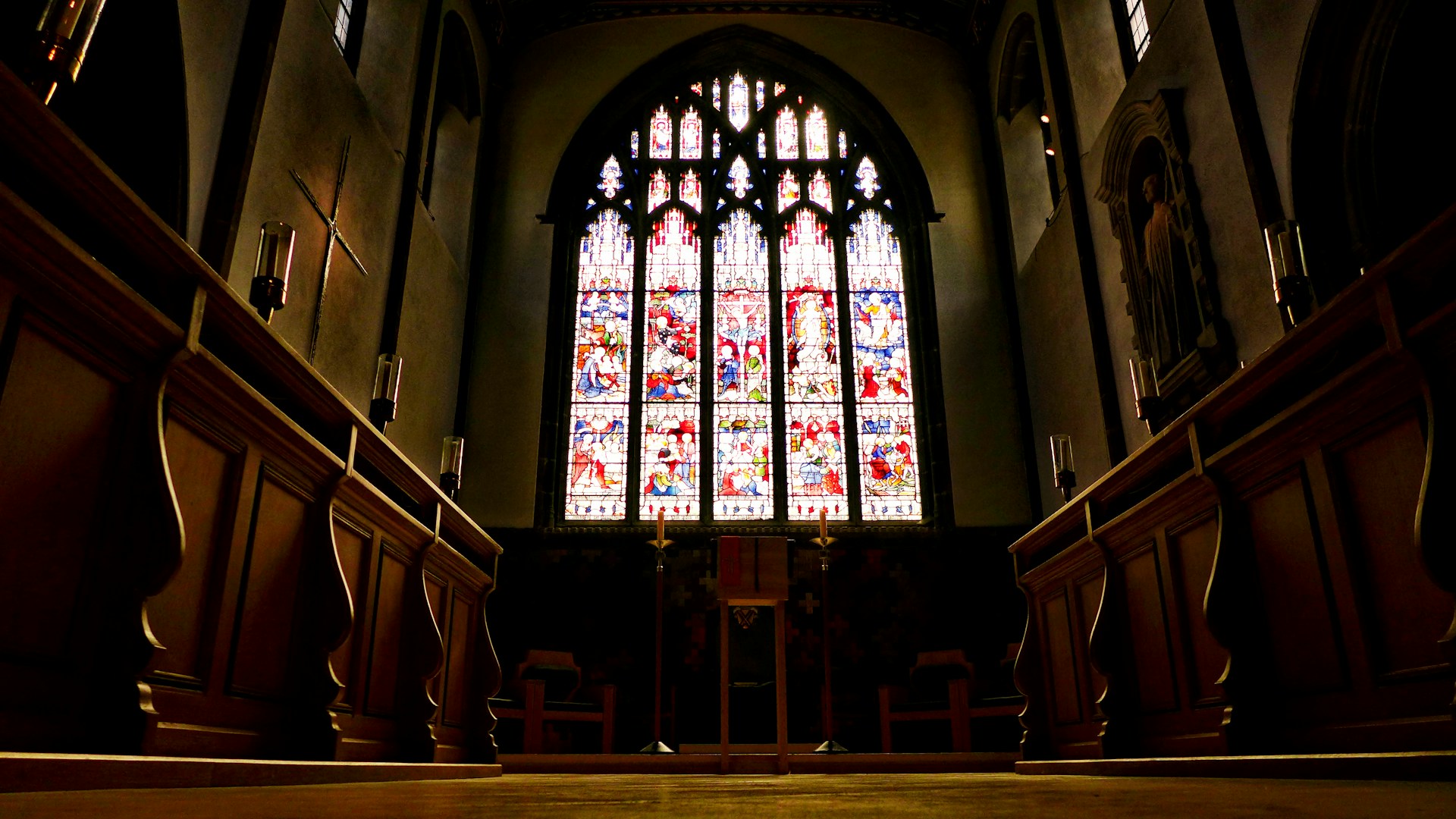 woman wearing yellow long-sleeved dress under white clouds and blue sky during daytime