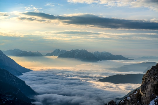 landscape photography of mountains surrounded with clouds in Dolomites Italy