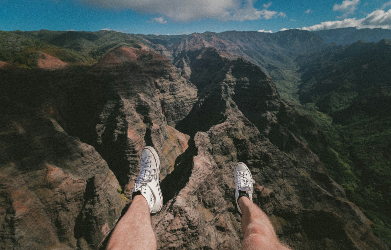 Canon EOS-1D X Mark II + Canon EF 16-35mm F4L IS USM sample photo. Person sitting on mountain photography