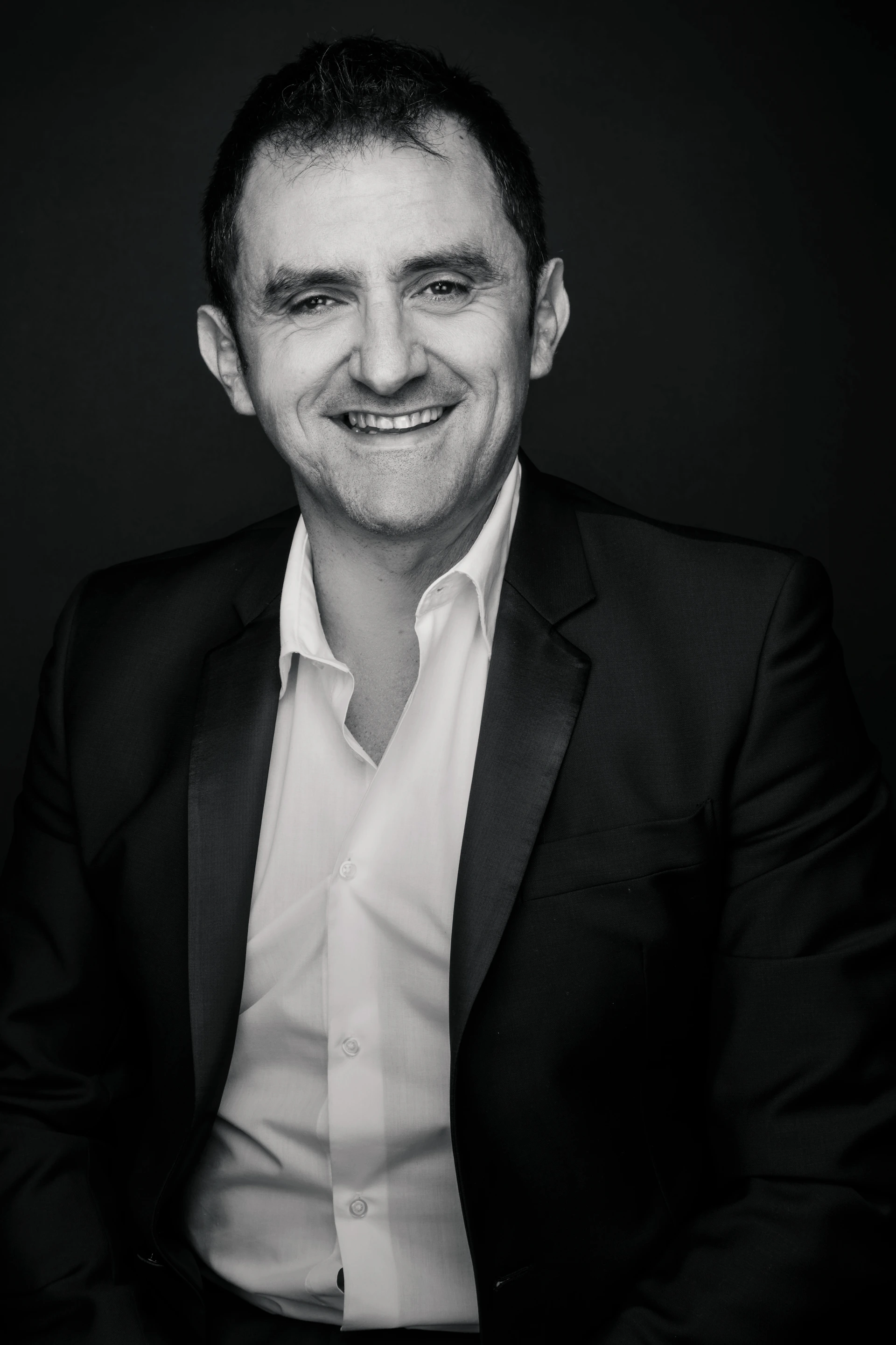 woman wearing yellow long-sleeved dress under white clouds and blue sky during daytime