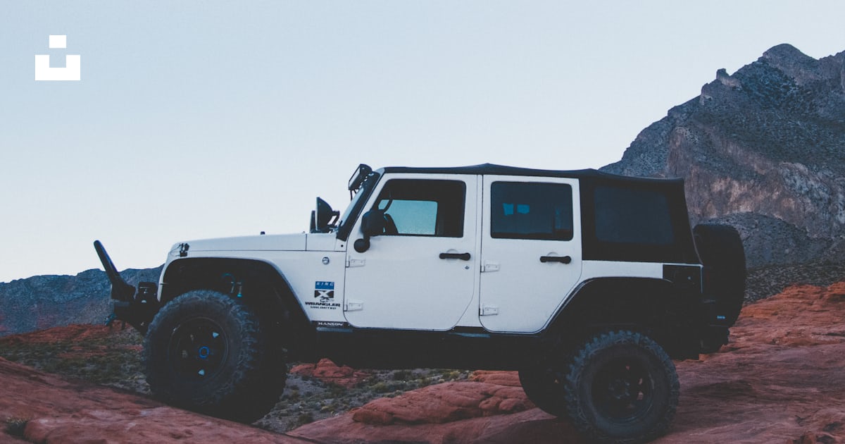 White and black SUV on brown rocks photo – Free Usa Image on Unsplash