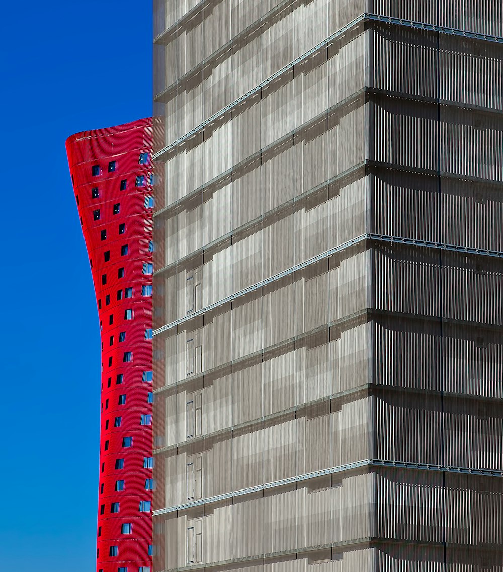 two gray and red buildings