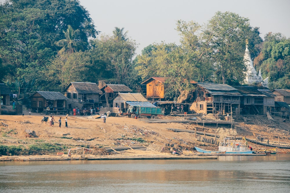 people standing near house