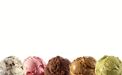 A colorful array of artisanal ice cream scoops in pastel bowls showcasing chocolate, vanilla, strawberry, and banana flavors.