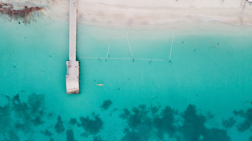 aerial view of dock surrounded by body of water