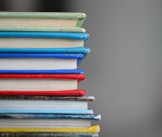 shallow focus photography of books