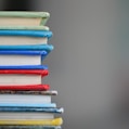 shallow focus photography of books