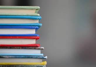 shallow focus photography of books