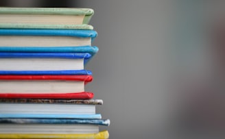 shallow focus photography of books