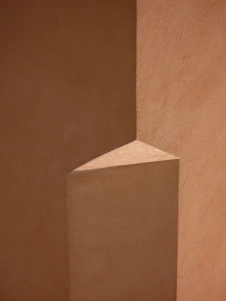 Close-up of a sleek, minimalist geopolymer home decor piece highlighting its smooth texture and eco-friendly material.