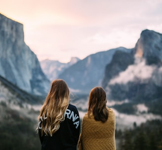 two women facing backwards