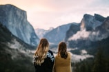 two women facing backwards