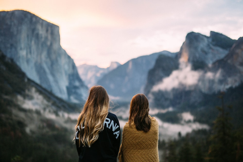 two women facing backwards