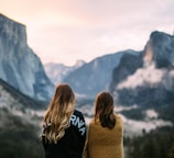 two women facing backwards