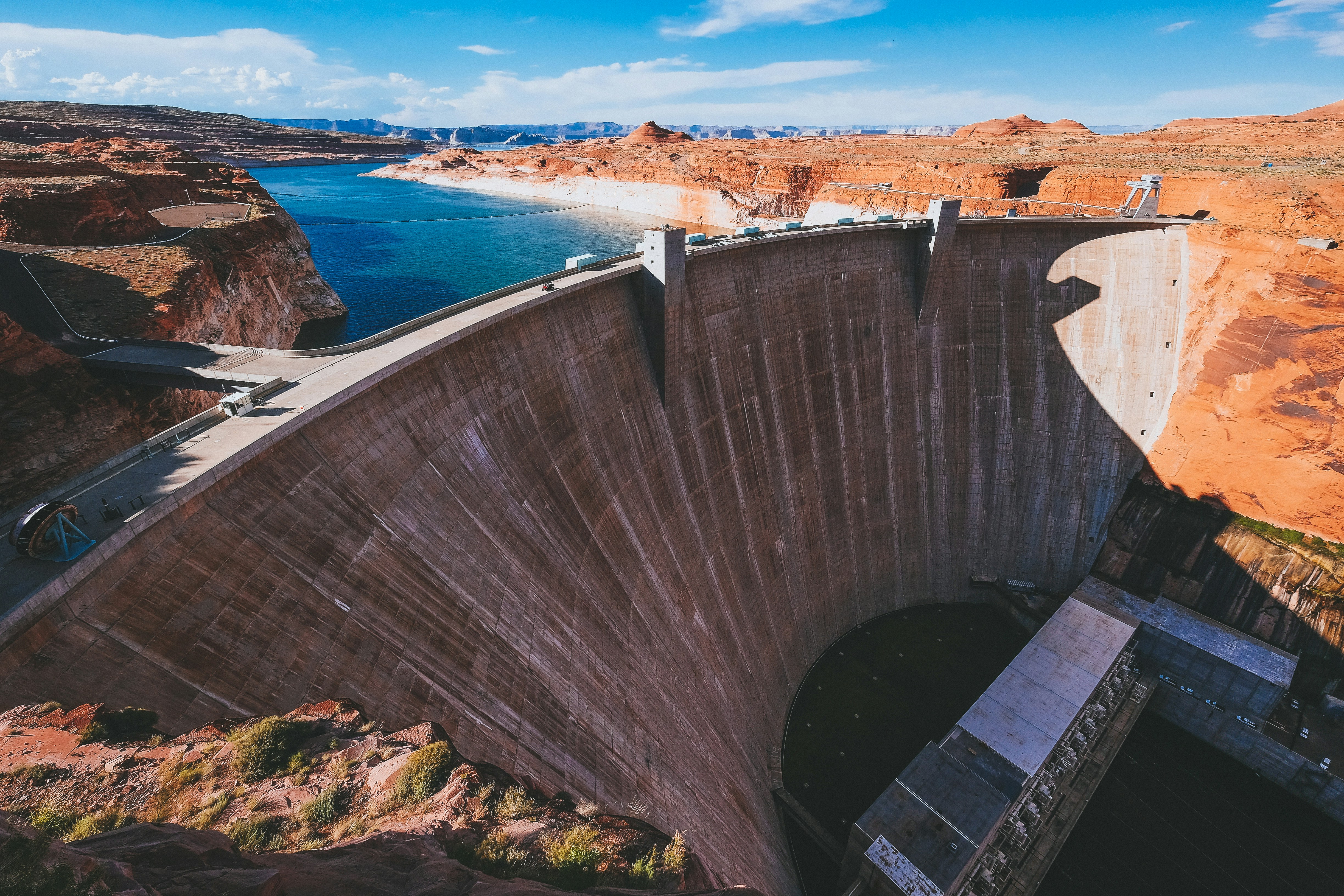 aerial photography of gray concrete water dam