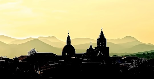 silhouette photography of cathedral under clear sky in Sant'Agata de' Goti Italy