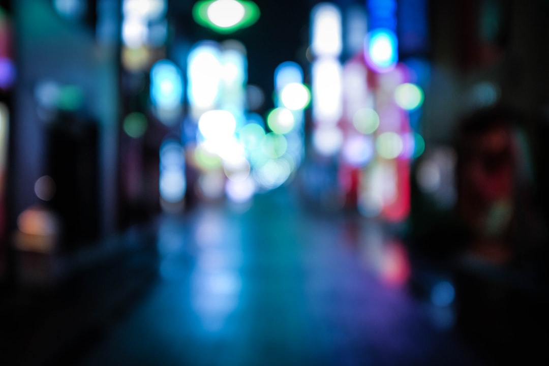 shallow focus photography of city lights