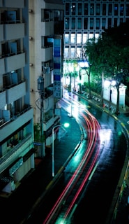 time lapse photography of cars along road