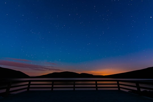 body of water surrounded by mountain in Mourne Mountains United Kingdom