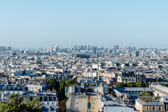 view of city during daytime under blue skies in Sacré-Cœur France