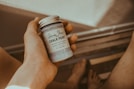 person's hand holding Chalk Paint bottle