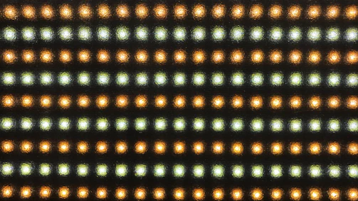 Grid layout of diverse client projects with subtle glow effects.