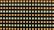 A grid pattern of small LED lights arranged in rows, alternating in color between warmer orange and cooler white tones. The lights are set against a dark background, emphasizing their glow.