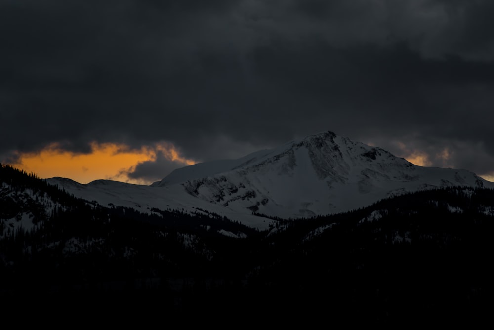 mountain covered by snow