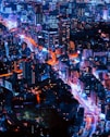 timelapse photography of vehicles and buildings