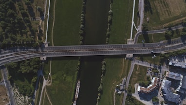 bird's eye view of bridge crossing body of water