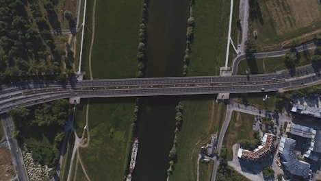 bird's eye view of bridge crossing body of water