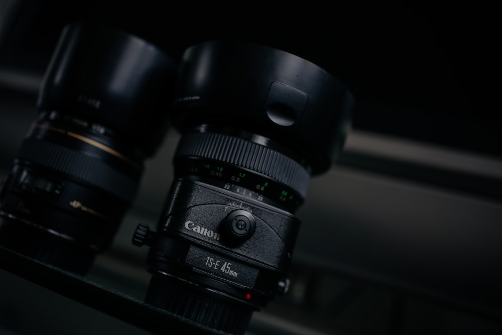 black Canon DSLR camera lens