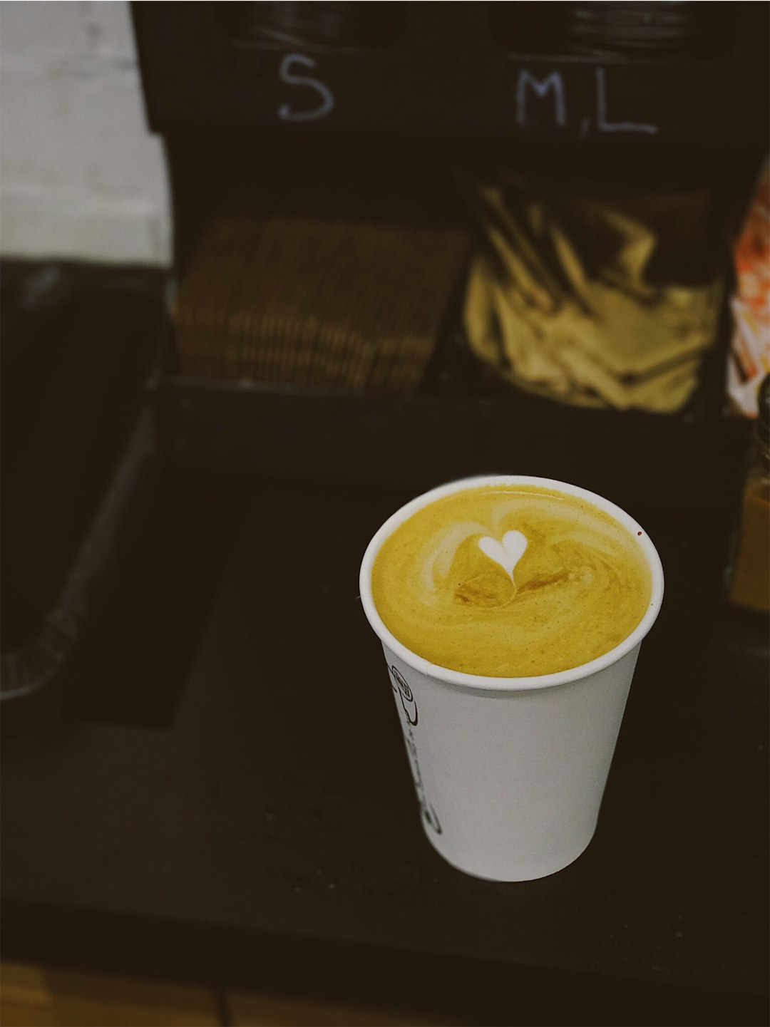 espresso in white disposable cup