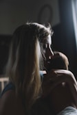 woman in San Francisco Bay Area carrying baby