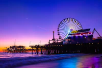 Carnival rides streaking light across the night