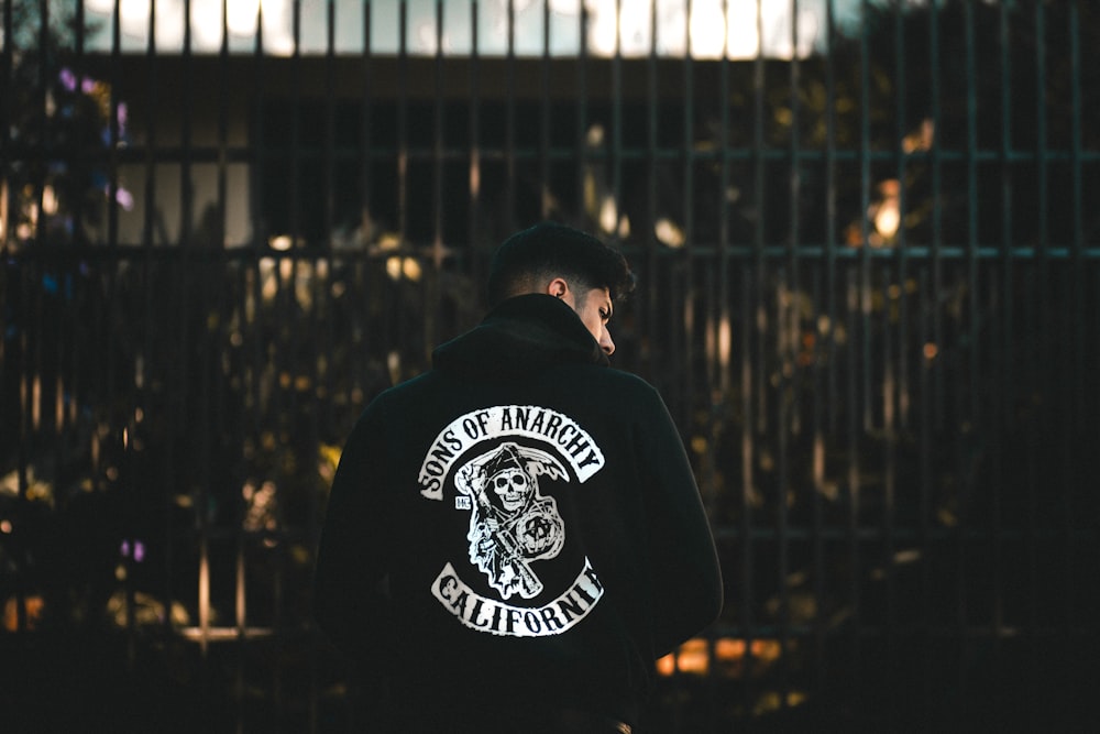 photo of man wearing Sons of Anarchy-printed jacket