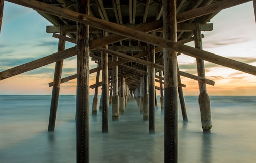 legs of pier in water