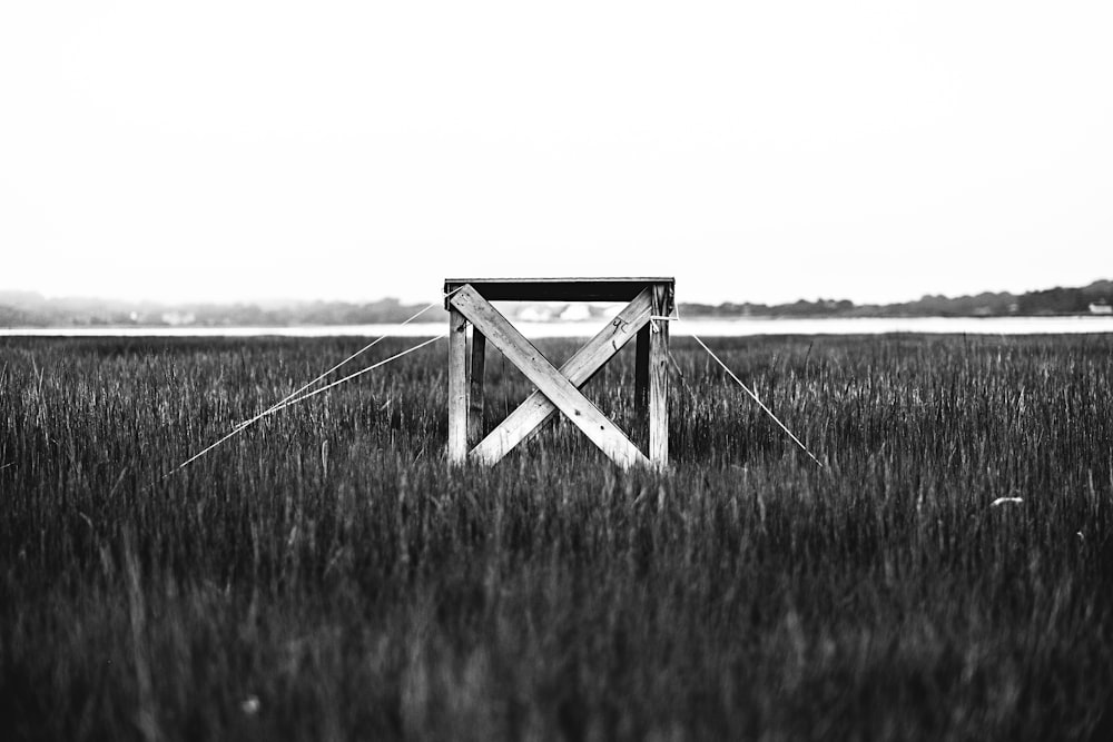 grayscale photo of wooden stool