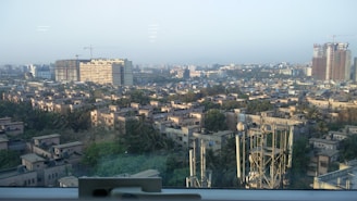 A panoramic view of a newly urbanized residential area with modern streets and green spaces.