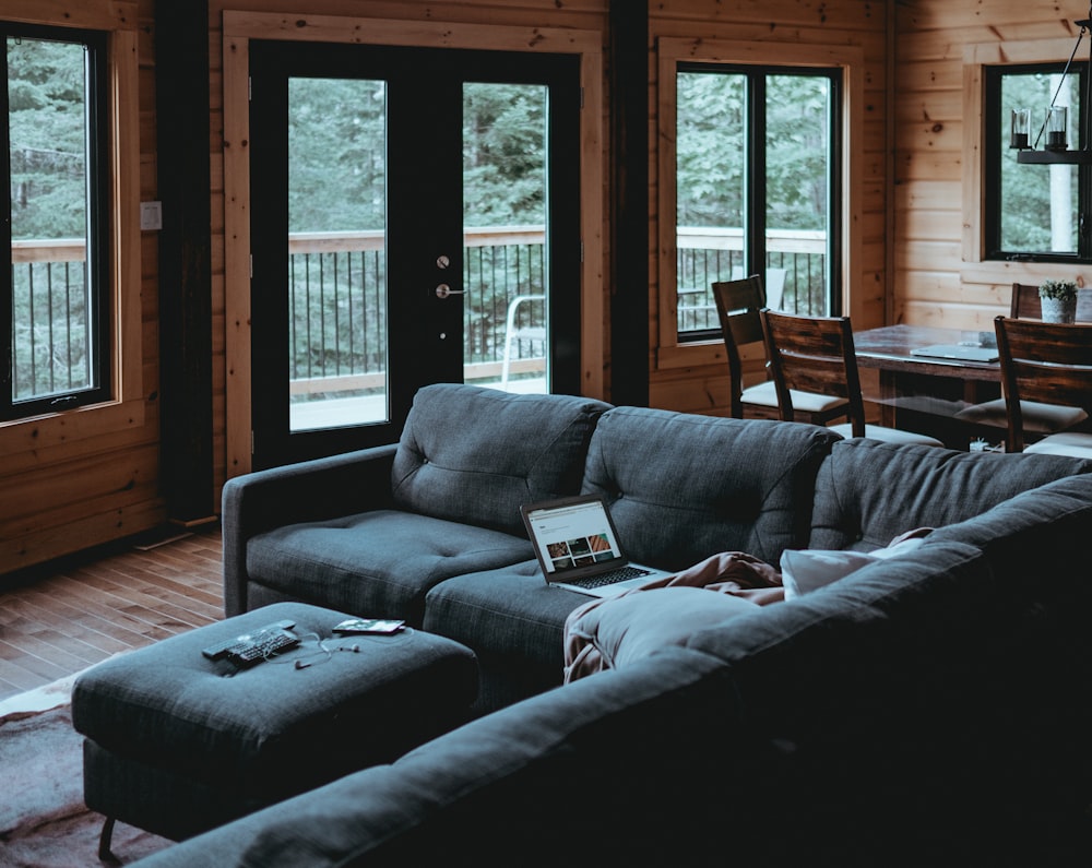 laptop computer on sectional couch