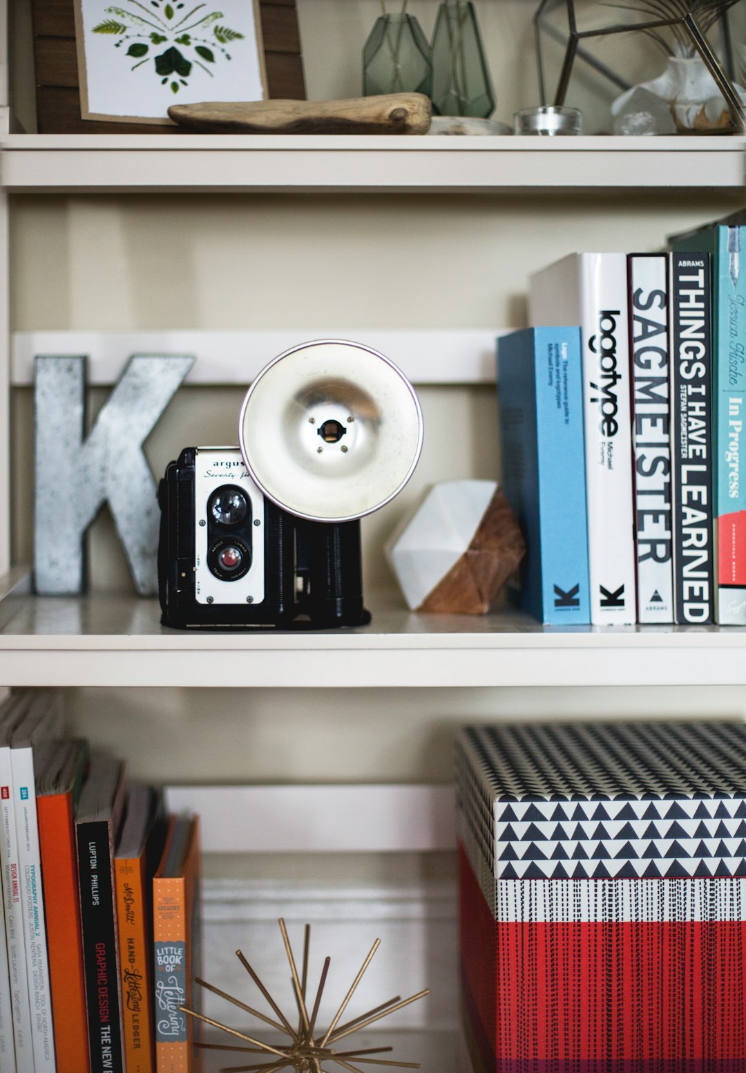 black camera on shelf