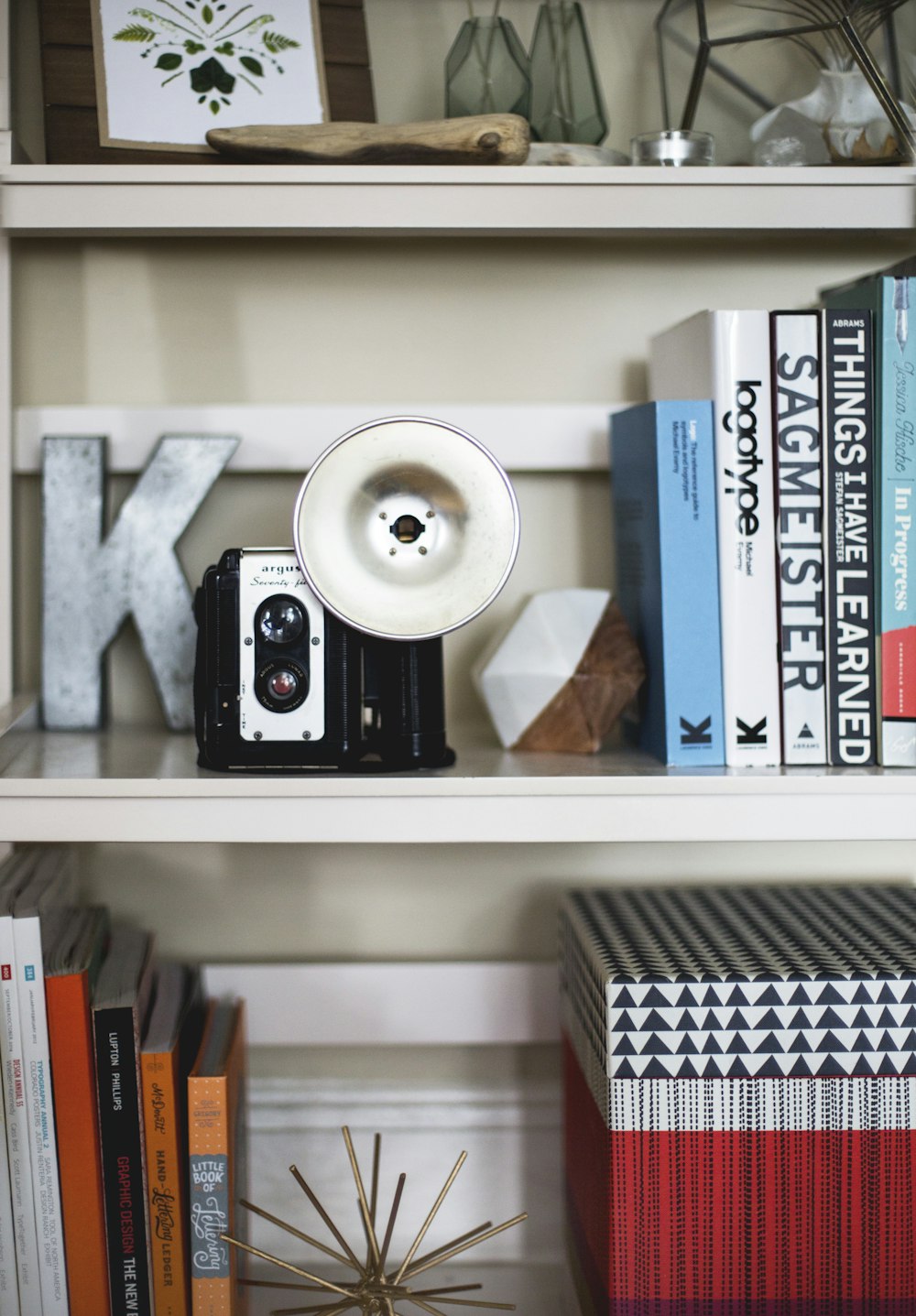 black camera on shelf