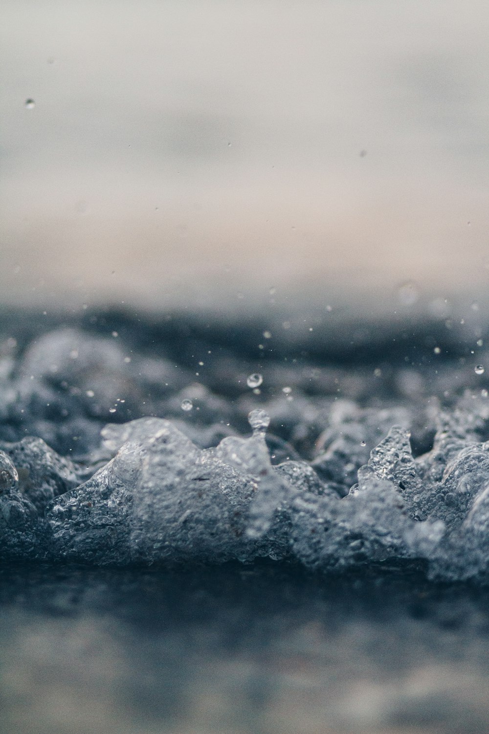 shallow focus photography of water splash