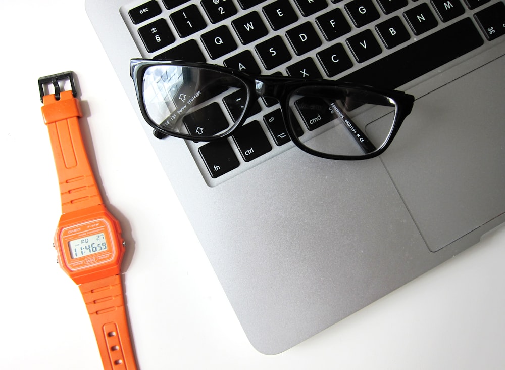 eyeglasses with black frame on MacBook Air