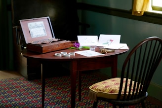 A friendly consultation scene with purple crafts displayed on a table.